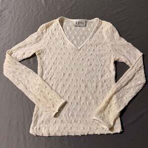 A. BRER Warm Heart Cream long sleeve V-Neck Shirt